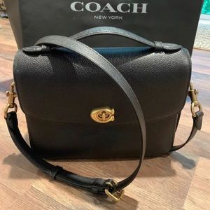 Coach Cassie Crossbody in Black also have one in Aurora Pink
